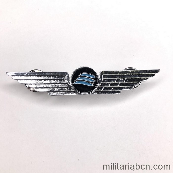 Libia. Alas de piloto de la compañía de aviación Afriqiyah Airways. Alas plateadas