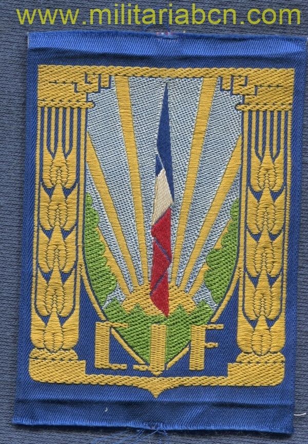Francia. Parche de los Chantiers de la Jeunesse Française. Fondo azul